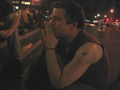 Phil sitting on the steps of Union Square, New York